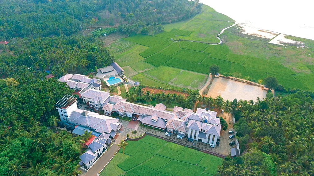 Ayurgreen Hospital panoramic scenic campus, open courtyards, and Kerala architecture